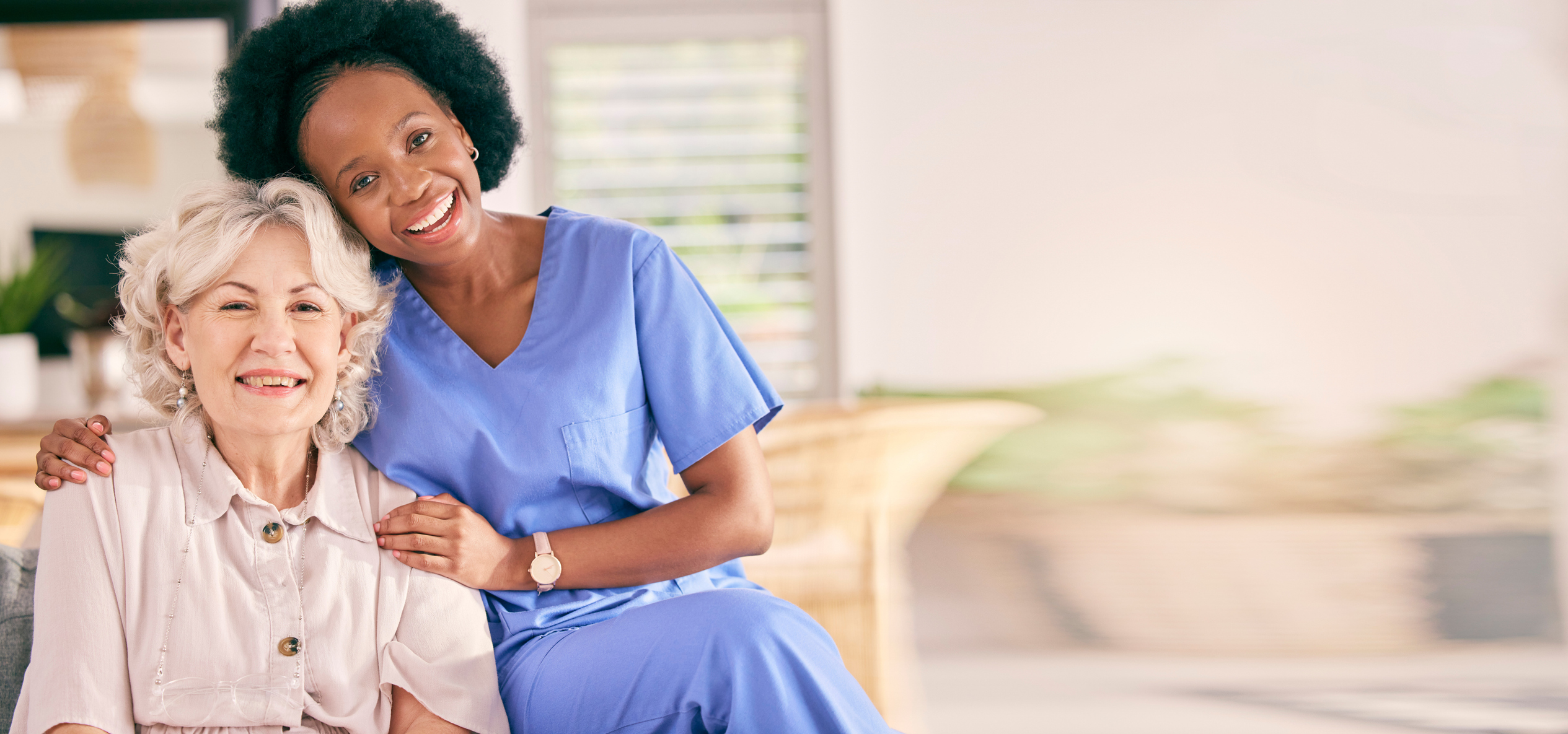 Happy, senior patient and a behavioral health caregiver.